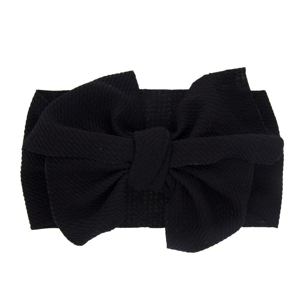 Newborn baby's solid-coloured bow headband