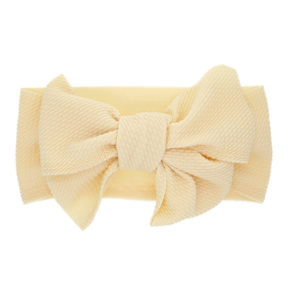 Newborn baby's solid-coloured bow headband
