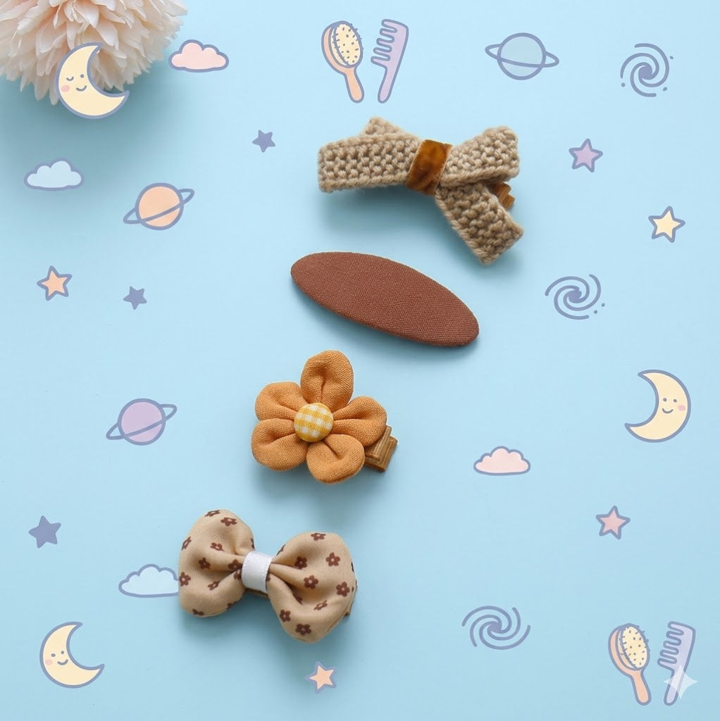 Set of decorative hair clips on a light background