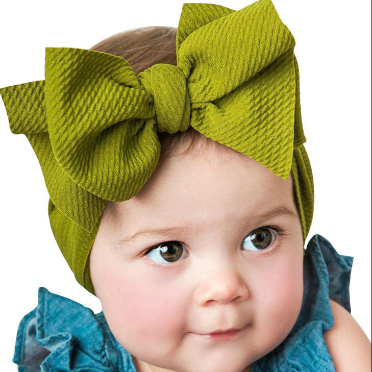 Newborn baby's solid-coloured bow headband