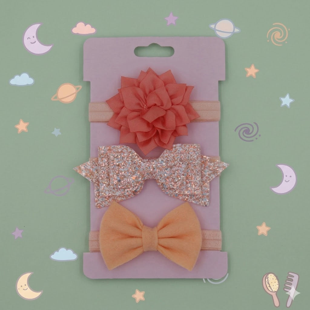 Set of hair accessories including a flower, bow, and headband on a pink card with 'Hair Accessories' text.