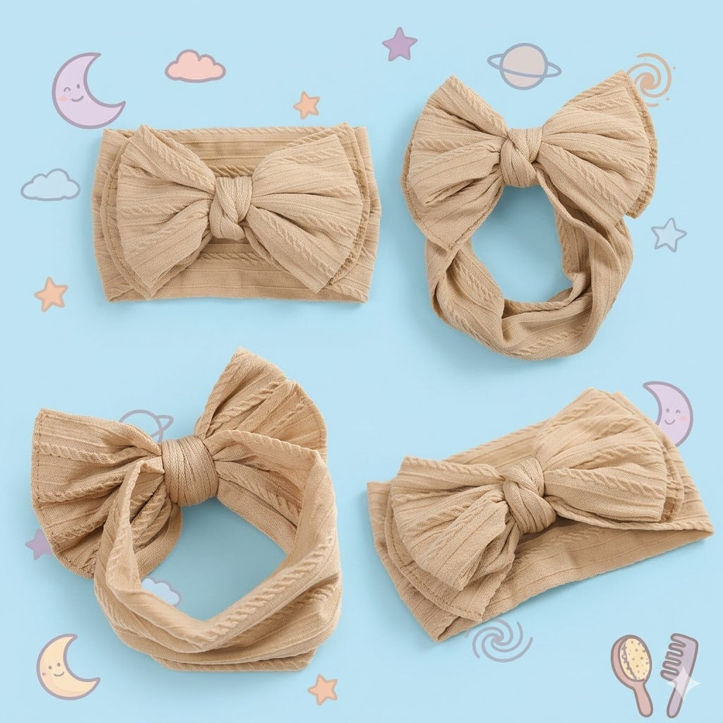 Set of four beige bow headbands on a white background