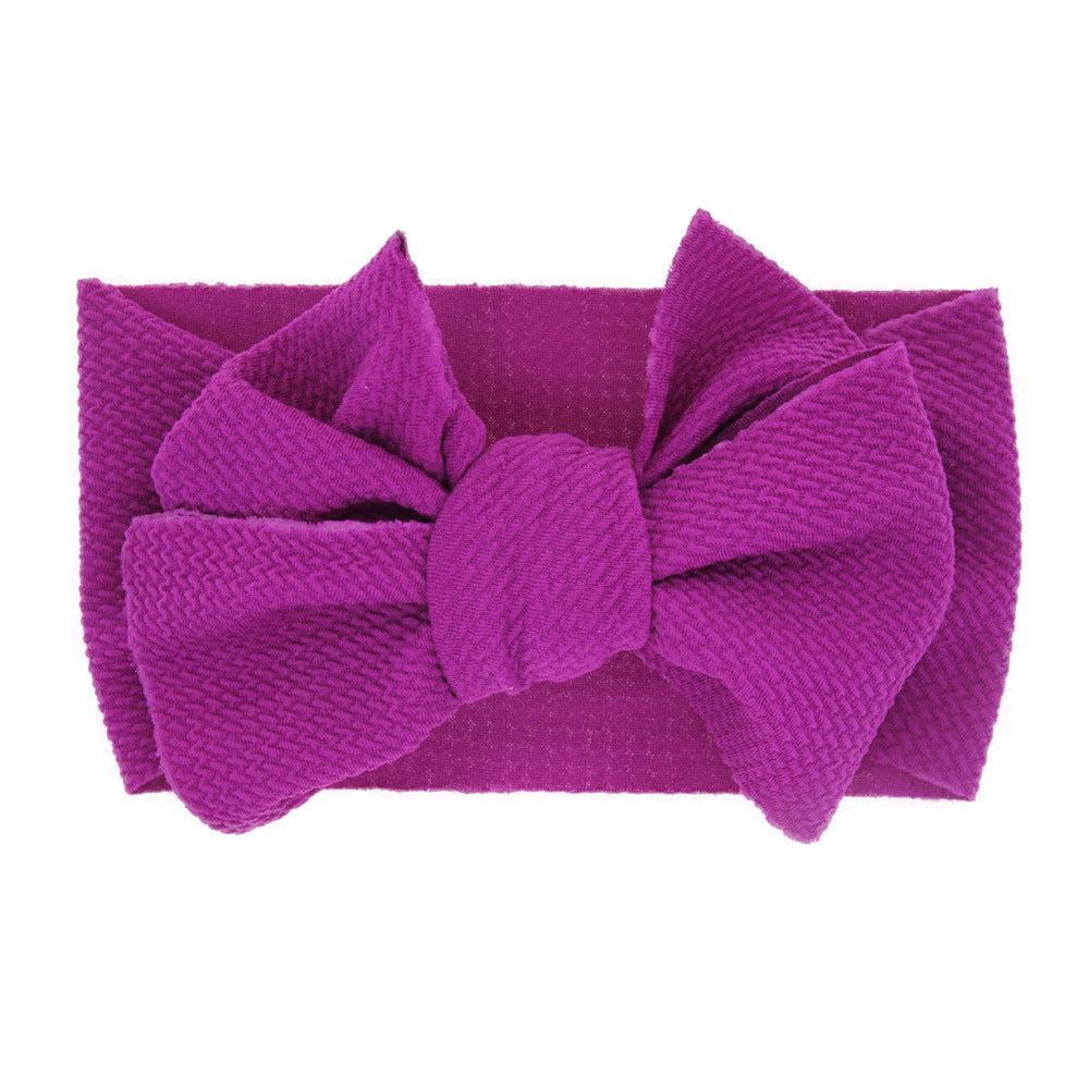 Newborn baby's solid-coloured bow headband