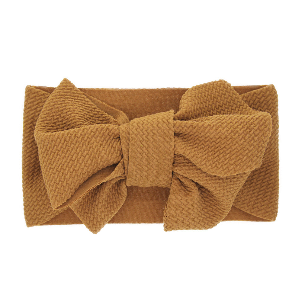 Newborn baby's solid-coloured bow headband