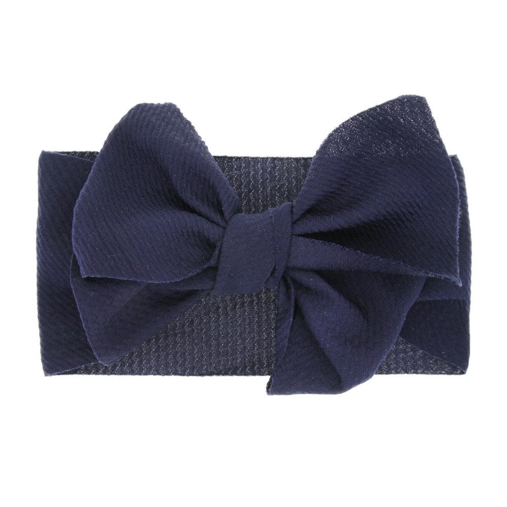 Newborn baby's solid-coloured bow headband
