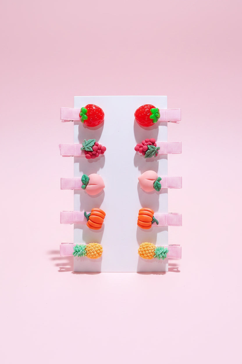 Set of colourful hair clips shaped like fruits and vegetables 
