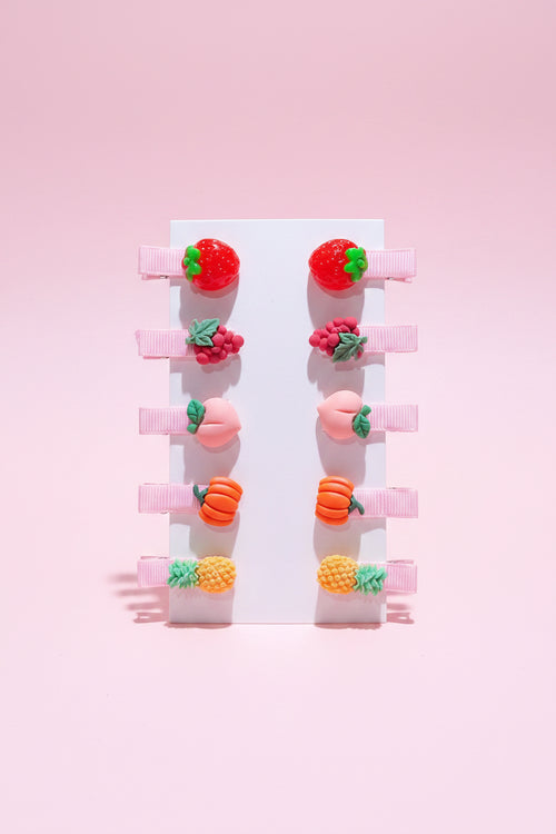Set of colourful hair clips shaped like fruits and vegetables 