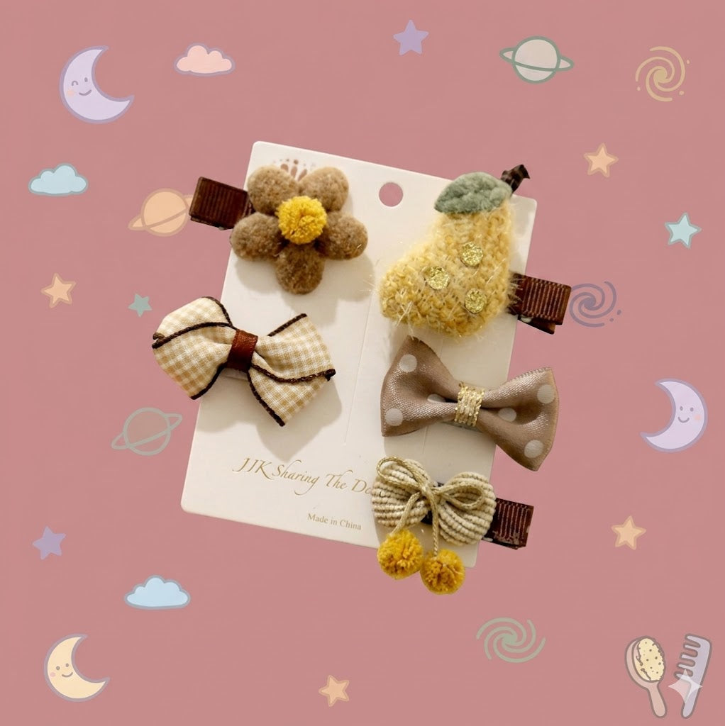 Set of decorative hair clips on a card 