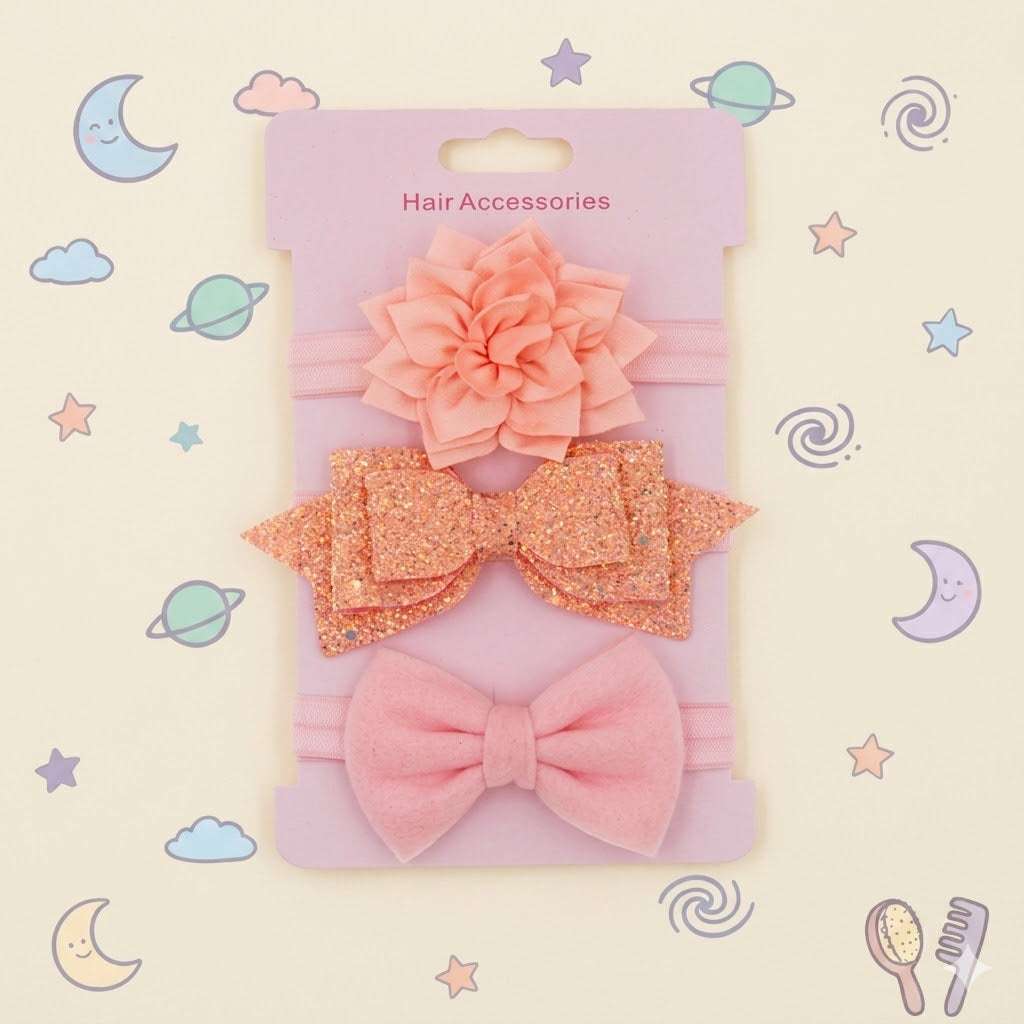 Set of pink hair accessories including a bow and a flower 