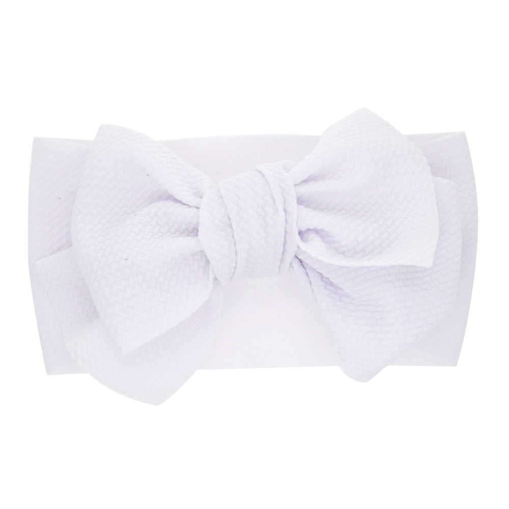 Newborn baby's solid-coloured bow headband