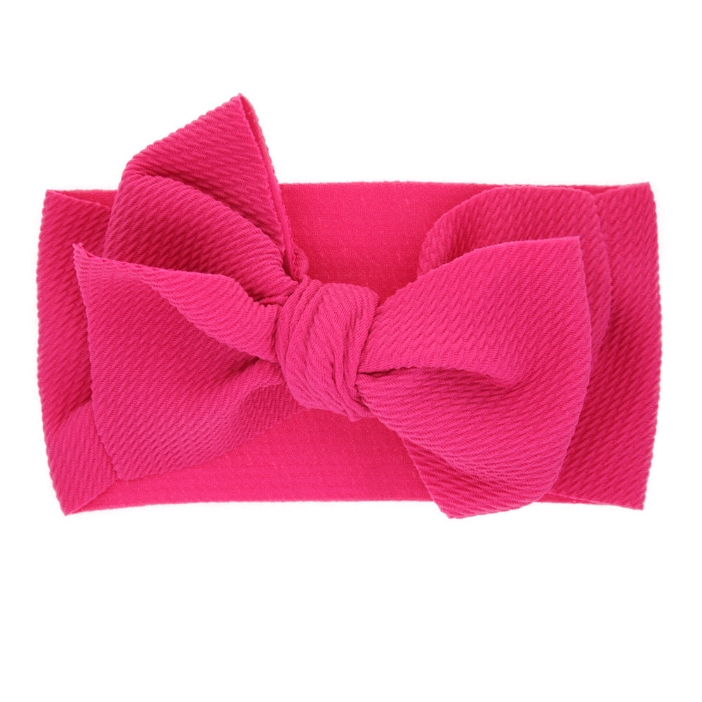 Newborn baby's solid-coloured bow headband