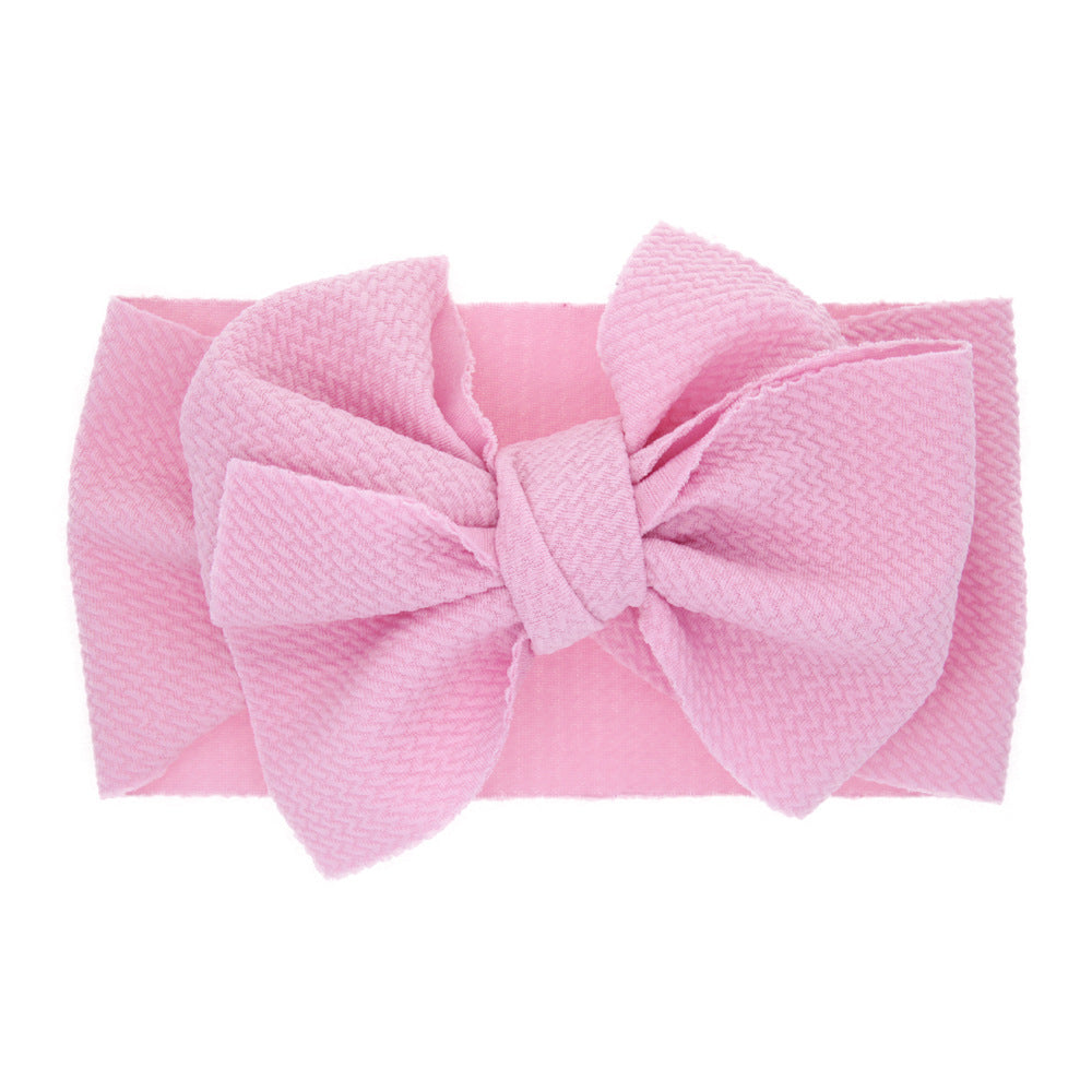 Newborn baby's solid-coloured bow headband