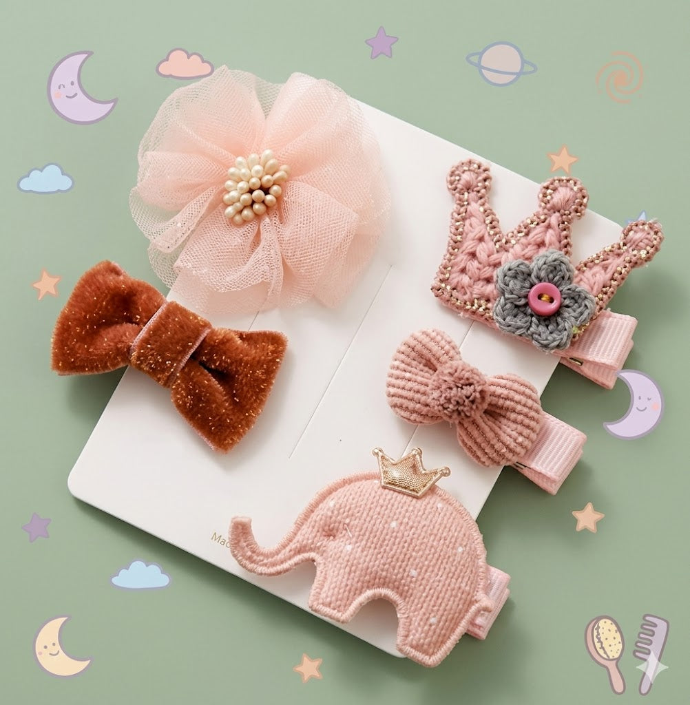 Set of decorative hair accessories including bows and a crown 