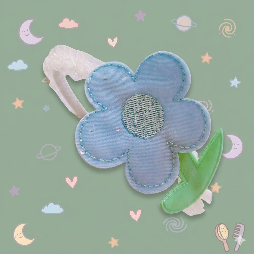  blue flower-shaped patch with a green leaf 