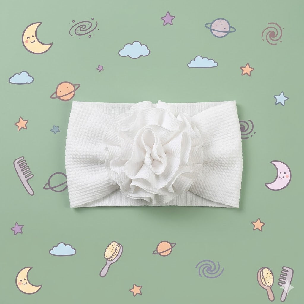 White textured fabric with a floral pattern on a sage background