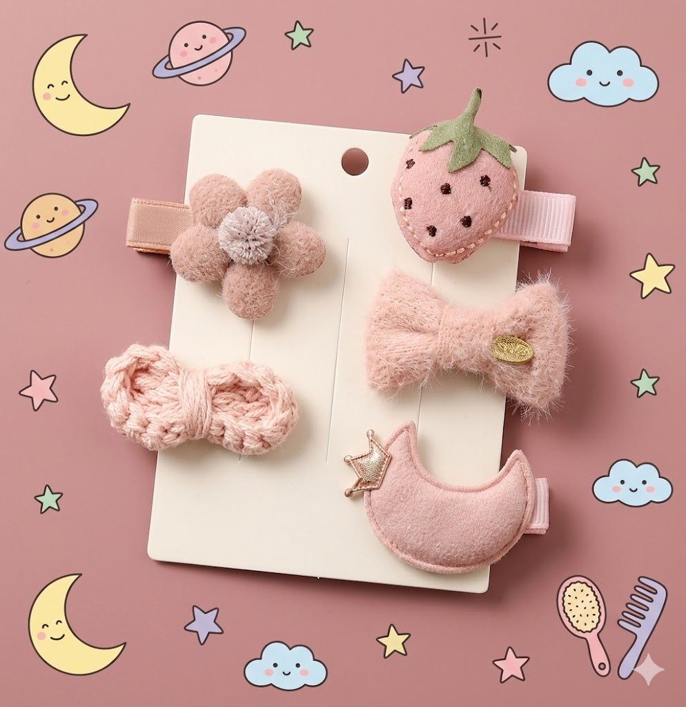 Set of pink children's hair accessories on a card 