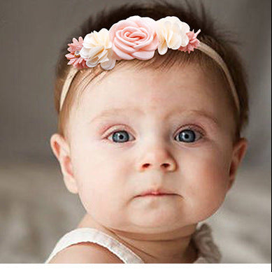 Child wearing floral headband